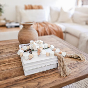 Marble and wood bead long decorative tassels for coastal bohemian home aesthetic interiors. Finish your styling with stunning accent pieces and compliment your home. 