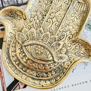 Hand casted brass hamsa hand tray. Perfect for beside styling, coffee table styling and adding a unique touch to coastal boho interior home styling 