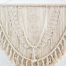 Kalee Macrame Wall Hanging large in natural tone macrame cotton. Perfect for coastal boho inspired home interior aesthetic. Wall statement piece.