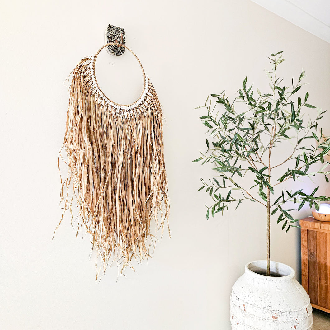 Kayana Raffia shell wall art hanging for the Coastal Bohemian, boho home interior style. Natural wall art, sustainable, eco-friendly wall art. Neutral, natural handmade wall decor art.